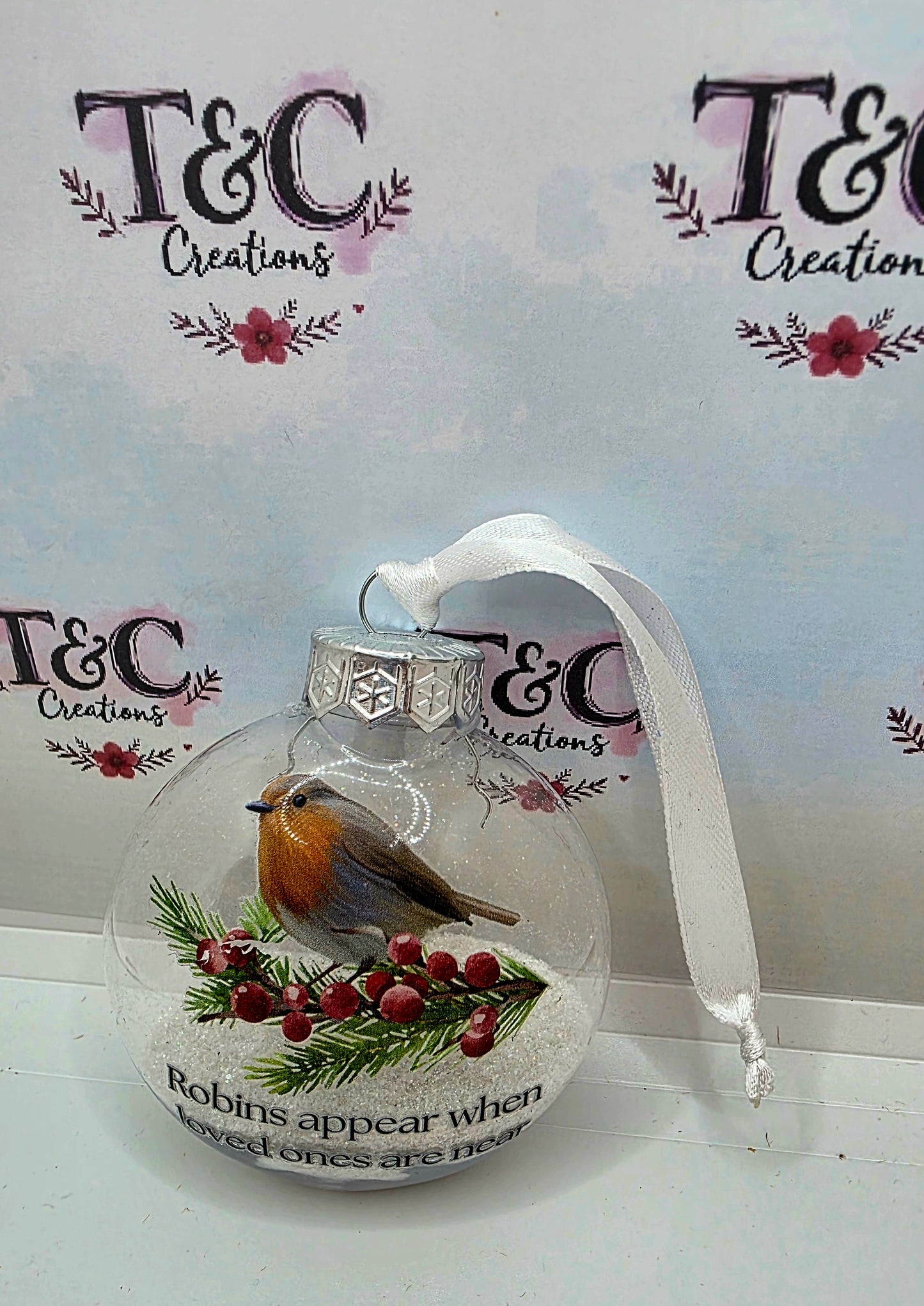 Christmas tree bauble with robin message for lost loves ones